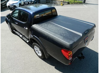 Aeroklas Speed Abdeckung - schwarze, körnige Oberfläche - Mitsubishi D/C 2009-2015 Aeroklas Speed Abdeckung - schwarze, körnige Oberfläche - Mitsubishi D/C 2009-2015