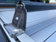 Kép 3/4 - Csomagtartó keresztrúd Wildtrak <span style="color:#FFA500;">gyári elektromos</span> rolóhoz - fekete, 1 pár - Ford 2020-2022